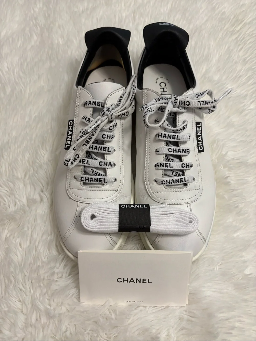 CHANEL White and Black Logo Lace-Up Sneakers